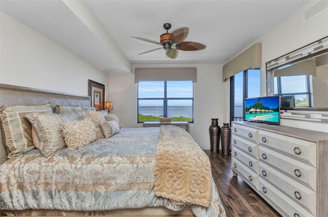 900 E Marion Ave Unit 1403, Punta Gorda, FL 33950 - bedroom featuring dark wood-type flooring and a ceiling fan