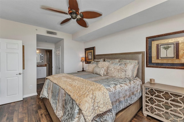 900 E Marion Ave Unit 1403, Punta Gorda, FL 33950 - bedroom featuring dark wood-type flooring, ensuite bath, and ceiling fan