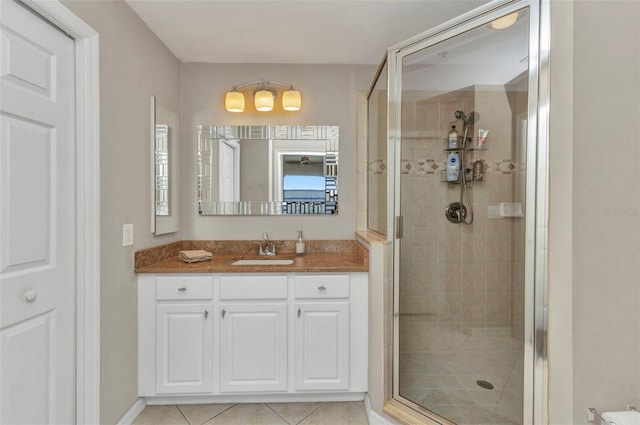 900 E Marion Ave Unit 1403, Punta Gorda, FL 33950 - full bathroom featuring vanity, a shower stall, and tile patterned floors