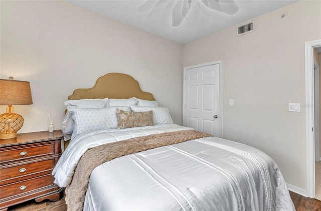 900 E Marion Ave Unit 1403, Punta Gorda, FL 33950 - bedroom featuring wood finished floors and a ceiling fan