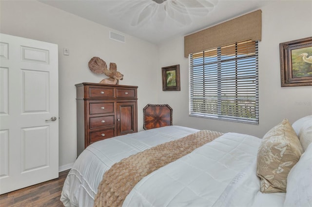 900 E Marion Ave Unit 1403, Punta Gorda, FL 33950 - bedroom featuring dark wood-style flooring and a ceiling fan