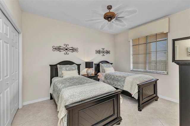 900 E Marion Ave Unit 1403, Punta Gorda, FL 33950 - bedroom featuring light tile patterned floors, a closet, and ceiling fan