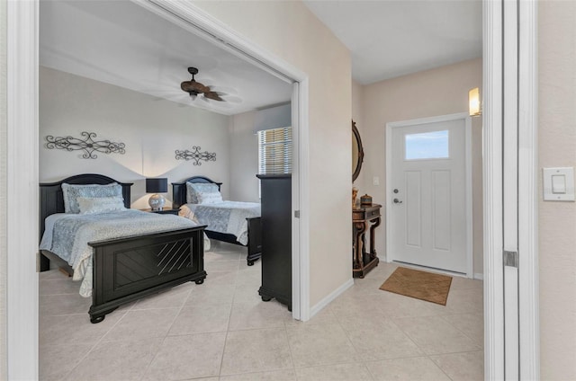 900 E Marion Ave Unit 1403, Punta Gorda, FL 33950 - bedroom with light tile patterned floors and ceiling fan