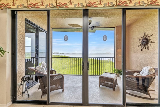 900 E Marion Ave Unit 1403, Punta Gorda, FL 33950 - sunroom / solarium with a water view and french doors