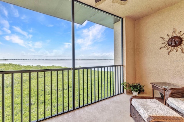 900 E Marion Ave Unit 1403, Punta Gorda, FL 33950 - sunroom featuring a water view and a ceiling fan