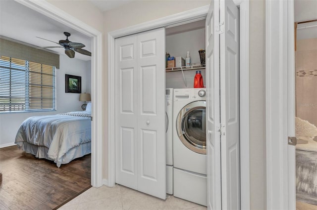 900 E Marion Ave Unit 1403, Punta Gorda, FL 33950 - laundry room featuring a ceiling fan and washer / dryer