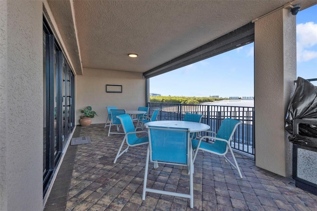 900 E Marion Ave Unit 1403, Punta Gorda, FL 33950 - patio / terrace with outdoor dining area