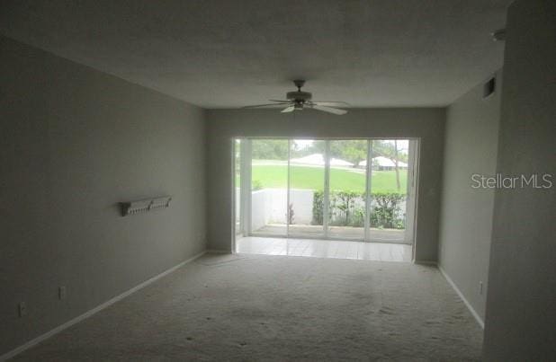 429 Cerromar Ln Unit 353, Venice, FL 34293 - carpeted spare room with a ceiling fan and baseboards