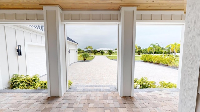 2073 Treasure Ln, Punta Gorda, FL 33982 - entryway with brick patterned flooring and wood ceiling