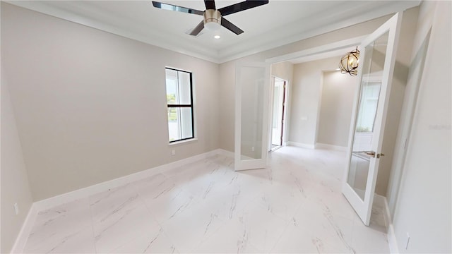 2073 Treasure Ln, Punta Gorda, FL 33982 - unfurnished bedroom with a chandelier, light marble finish floors, recessed lighting, and a ceiling fan