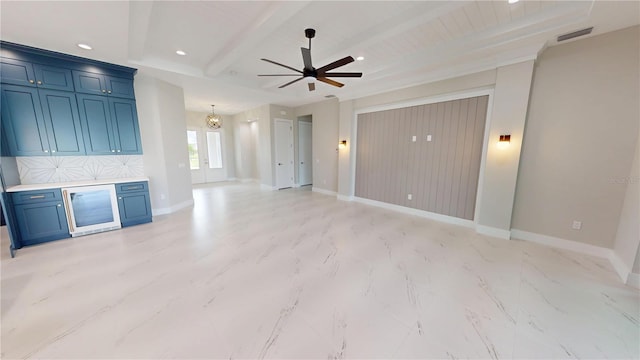 2073 Treasure Ln, Punta Gorda, FL 33982 - unfurnished living room featuring beverage cooler, ceiling fan, beamed ceiling, and recessed lighting