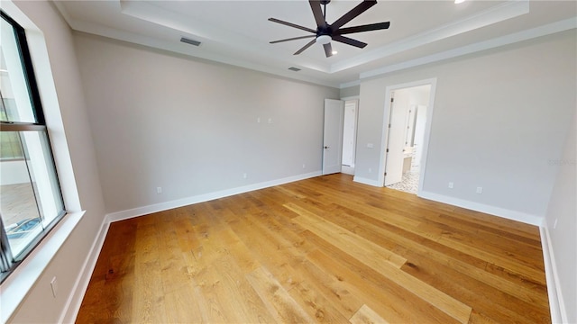 2073 Treasure Ln, Punta Gorda, FL 33982 - unfurnished room with a tray ceiling, a ceiling fan, light wood-style floors, crown molding, and recessed lighting