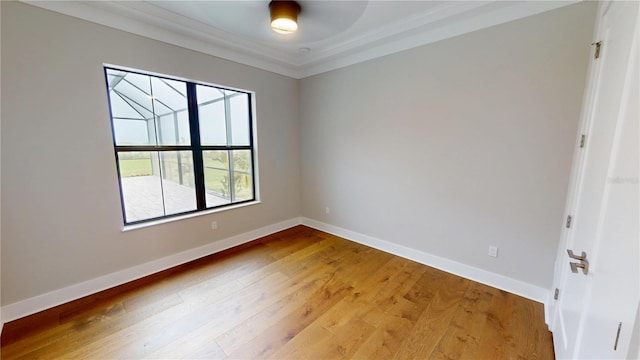2073 Treasure Ln, Punta Gorda, FL 33982 - empty room featuring wood finished floors and ornamental molding