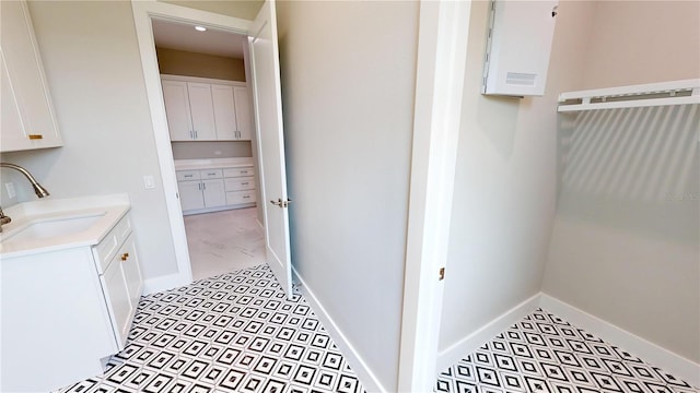 2073 Treasure Ln, Punta Gorda, FL 33982 - washroom featuring a sink and light tile patterned flooring
