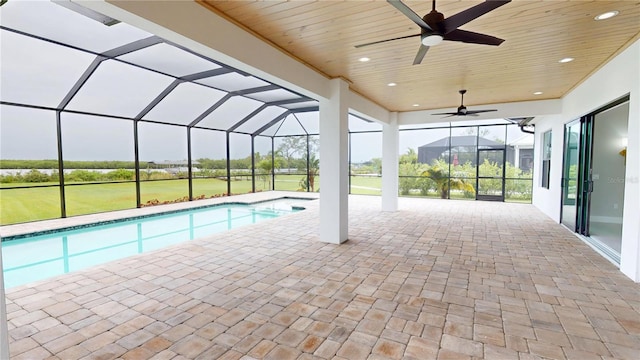 2073 Treasure Ln, Punta Gorda, FL 33982 - view of pool featuring a ceiling fan, a patio area, glass enclosure, and a pool with connected hot tub