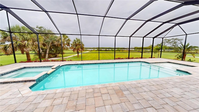 2073 Treasure Ln, Punta Gorda, FL 33982 - view of pool featuring a pool with connected hot tub, a lanai, and a patio area