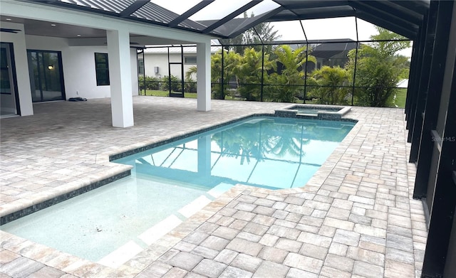 2073 Treasure Ln, Punta Gorda, FL 33982 - view of pool with a patio, a pool with connected hot tub, and glass enclosure