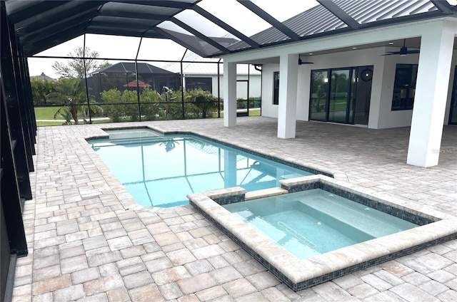 2073 Treasure Ln, Punta Gorda, FL 33982 - view of swimming pool featuring ceiling fan, a patio area, a pool with connected hot tub, and a lanai