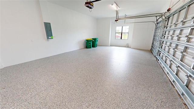 2073 Treasure Ln, Punta Gorda, FL 33982 - garage with electric panel and a garage door opener