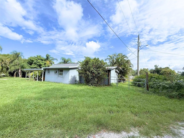 1426 Gary St, Punta Gorda, FL 33982 - view of yard featuring a carport