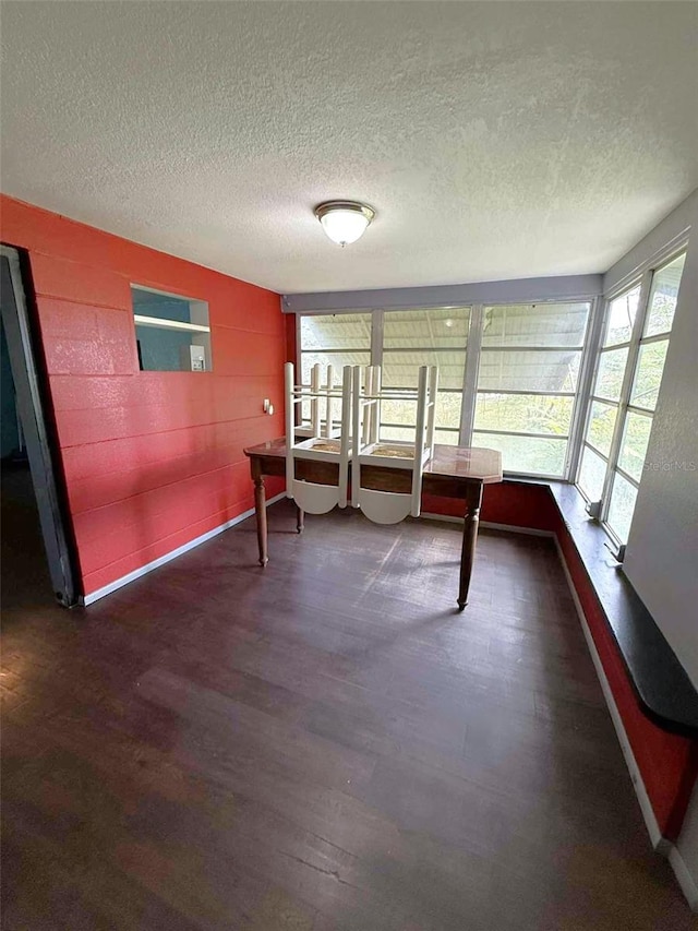 1426 Gary St, Punta Gorda, FL 33982 - sunroom with a textured ceiling and wood finished floors
