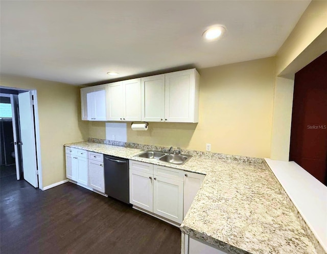1426 Gary St, Punta Gorda, FL 33982 - kitchen with stainless steel dishwasher, dark wood-style flooring, light countertops, white cabinetry, and recessed lighting