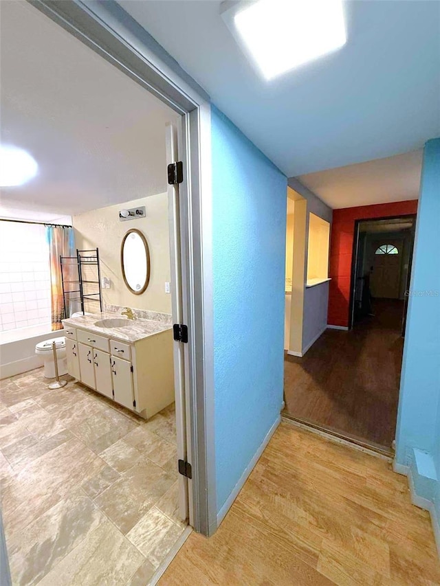 1426 Gary St, Punta Gorda, FL 33982 - hallway with baseboards and a sink
