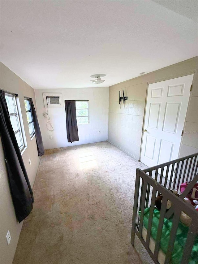 1426 Gary St, Punta Gorda, FL 33982 - carpeted empty room featuring a wall unit AC