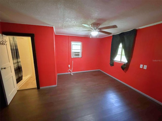 1426 Gary St, Punta Gorda, FL 33982 - spare room featuring a textured ceiling, a ceiling fan, wood finished floors, ornamental molding, and cooling unit