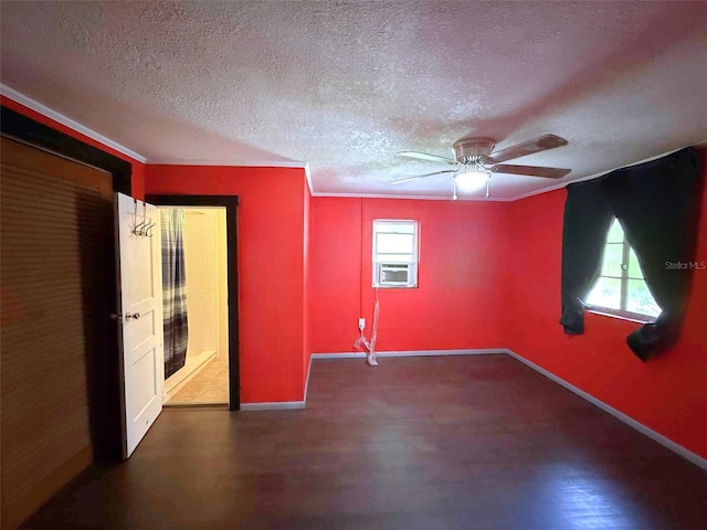 1426 Gary St, Punta Gorda, FL 33982 - unfurnished room featuring a ceiling fan, a textured ceiling, cooling unit, and wood finished floors