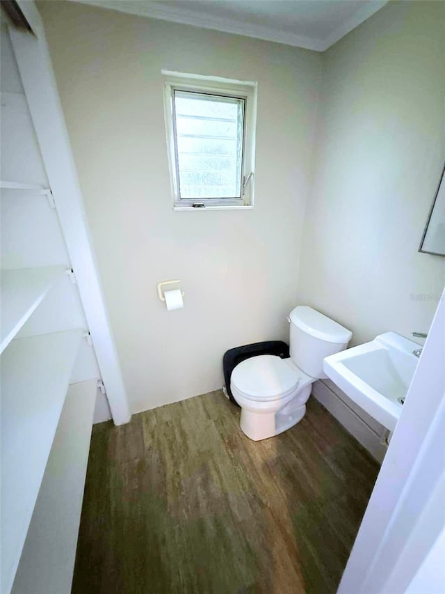 1426 Gary St, Punta Gorda, FL 33982 - bathroom with wood finished floors and ornamental molding