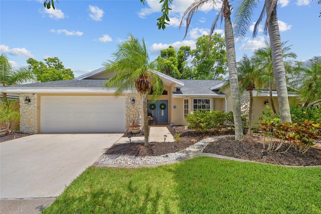 2474 Rio De Janeiro Ave, Punta Gorda, FL 33983 - single story home featuring driveway, a garage, stucco siding, a front lawn, and a shingled roof