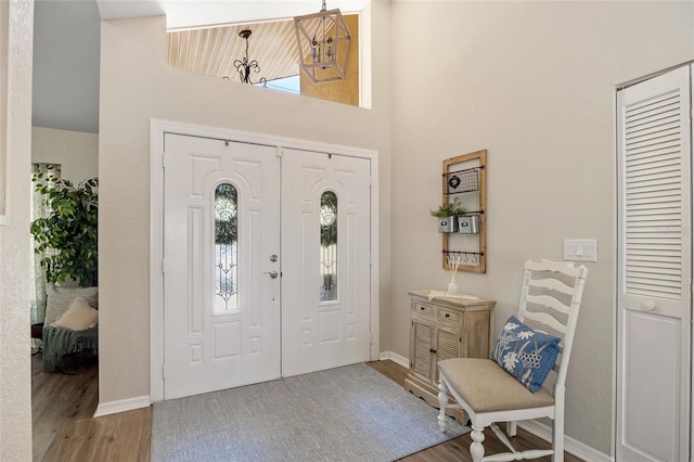 2474 Rio De Janeiro Ave, Punta Gorda, FL 33983 - foyer entrance with wood finished floors and a high ceiling