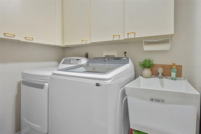 2474 Rio De Janeiro Ave, Punta Gorda, FL 33983 - washroom with separate washer and dryer and cabinet space