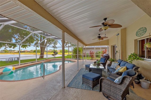 2474 Rio De Janeiro Ave, Punta Gorda, FL 33983 - outdoor pool with a patio, a water view, a ceiling fan, an outdoor living space, and glass enclosure