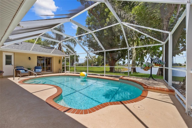 2474 Rio De Janeiro Ave, Punta Gorda, FL 33983 - swimming pool featuring a patio area and glass enclosure