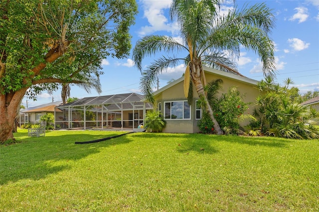 2474 Rio De Janeiro Ave, Punta Gorda, FL 33983 - view of grassy yard with glass enclosure