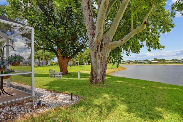 2474 Rio De Janeiro Ave, Punta Gorda, FL 33983 - view of grassy yard featuring a water view