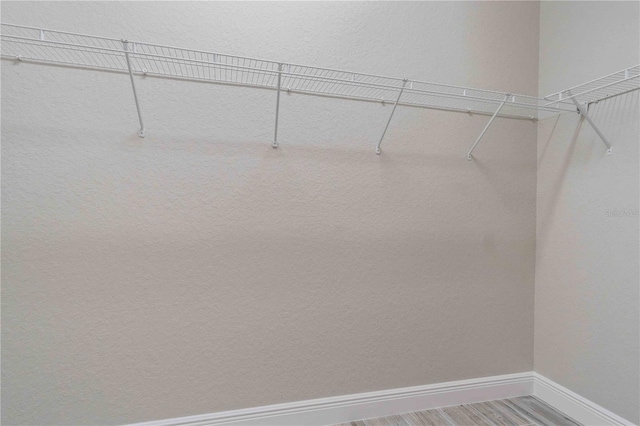 4026 Vasco St, Punta Gorda, FL 33950 - walk in closet featuring wood finished floors