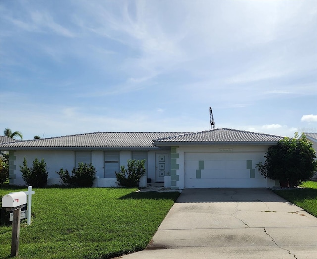 110 Hibiscus Dr, Punta Gorda, FL 33950 - single story home with a tile roof, concrete driveway, an attached garage, and a front lawn
