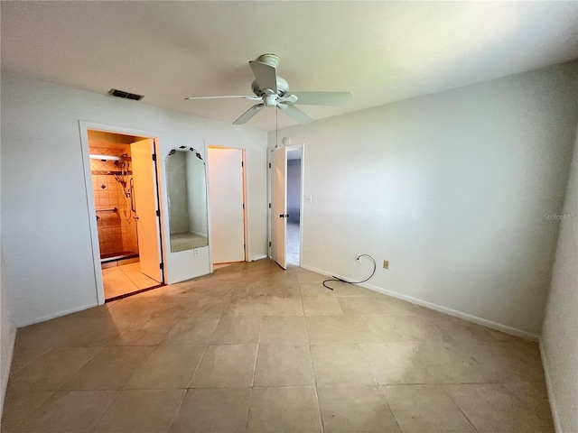 25225 Rampart Blvd Unit 502, Punta Gorda, FL 33983 - unfurnished bedroom featuring ceiling fan and connected bathroom
