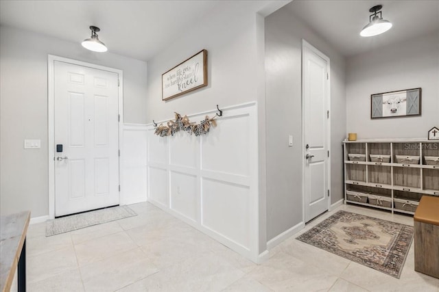 2596 Buckthorn Loop, North Port, FL 34289 - entrance foyer featuring light tile patterned floors