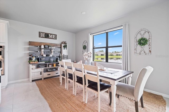 2596 Buckthorn Loop, North Port, FL 34289 - dining space with baseboards