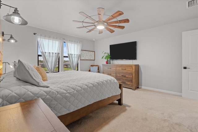 2596 Buckthorn Loop, North Port, FL 34289 - bedroom featuring light carpet and a ceiling fan