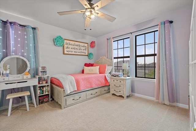 2596 Buckthorn Loop, North Port, FL 34289 - carpeted bedroom with baseboards and ceiling fan