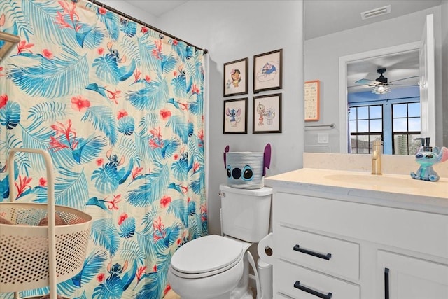 2596 Buckthorn Loop, North Port, FL 34289 - bathroom with vanity, a ceiling fan, and a shower with shower curtain