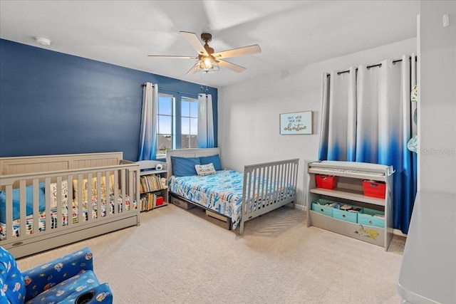 2596 Buckthorn Loop, North Port, FL 34289 - carpeted bedroom with a ceiling fan and baseboards