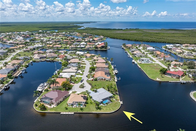 1457 Sea Fan Dr, Punta Gorda, FL 33950 - aerial perspective of suburban area with a large body of water