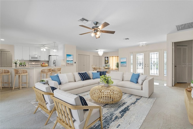 1457 Sea Fan Dr, Punta Gorda, FL 33950 - living area featuring ceiling fan and light colored carpet