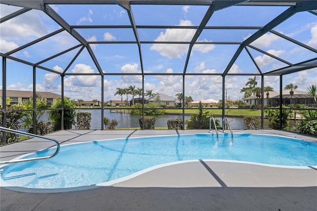 1457 Sea Fan Dr, Punta Gorda, FL 33950 - swimming pool featuring a water view, a residential view, and a lanai